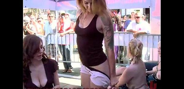  Babe with electric butt plug in public